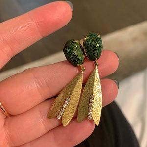 18k gold earrings with diamonds and gorgeous green beetles.